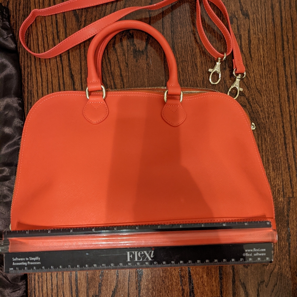 Coral leather purse from Danier (premier Canadian leather brand)